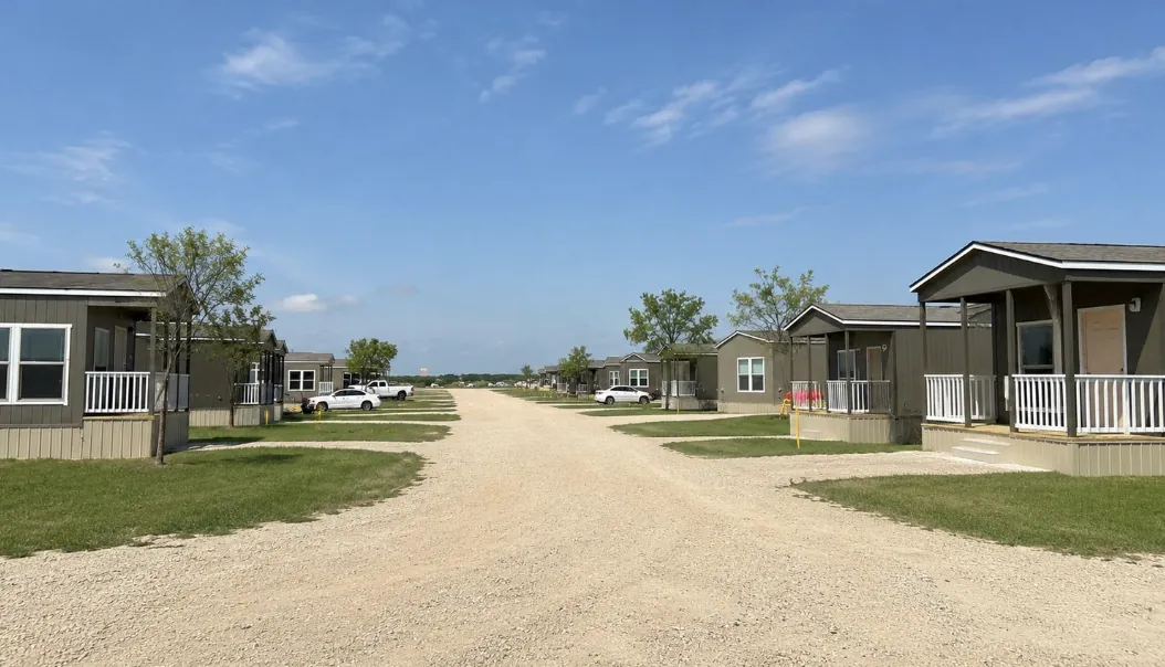 A street of tiny homes with covered porches at Buck Creek