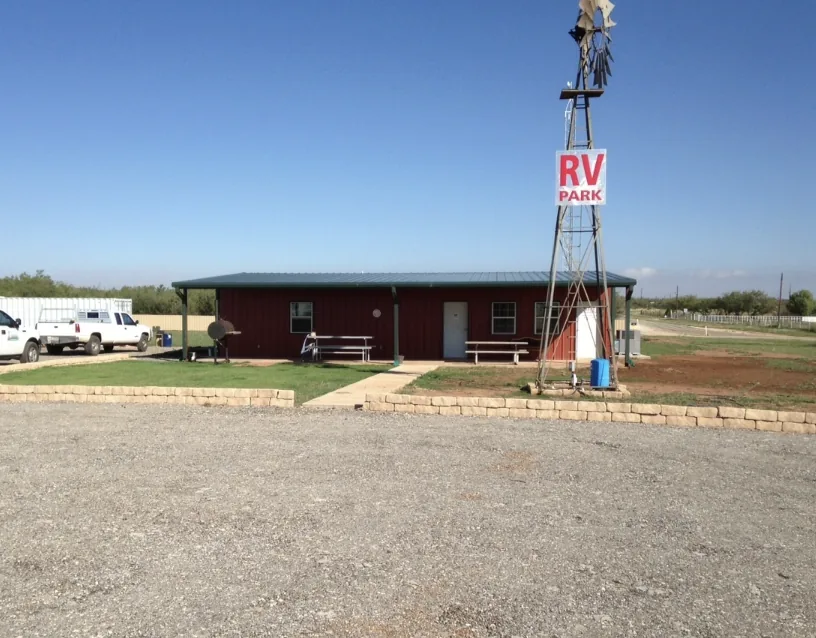 Windmill RV Park office building beside the windmill sign