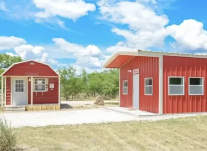 The red laundry and office buildings side by side