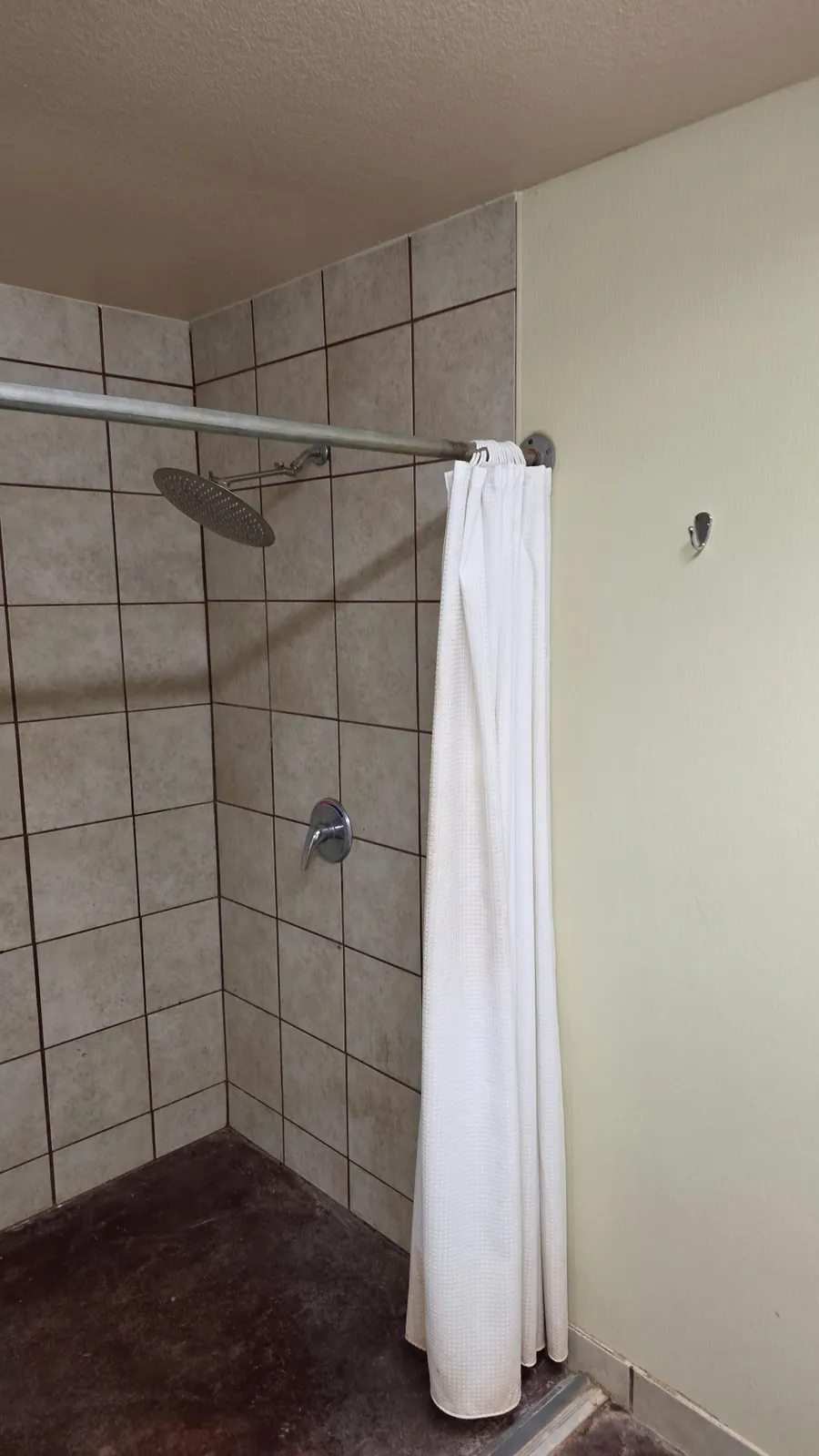 Tiled shower stall in the Windmill RV Park bathhouse